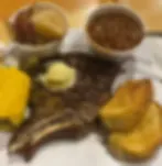 Weekend Special - 18oz Bone-In Ribeye Steak Dinner Served with soup or salad and potato