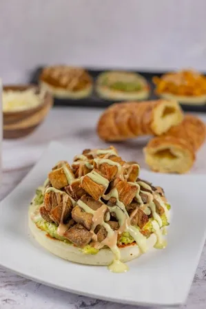 Grilled Steak, Pork Skin and Guacamole Corn Cake